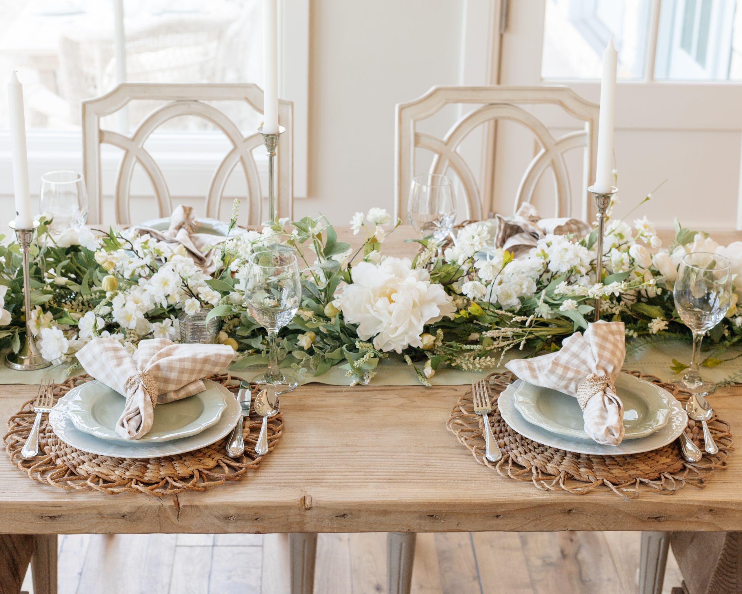 sage green and white place setting