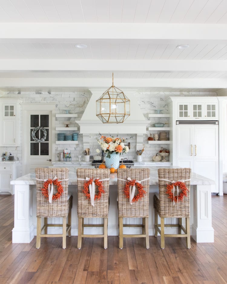 fall home tour fall decor entertaining orange and blue decor flowers pumpkins tables capes home decor
