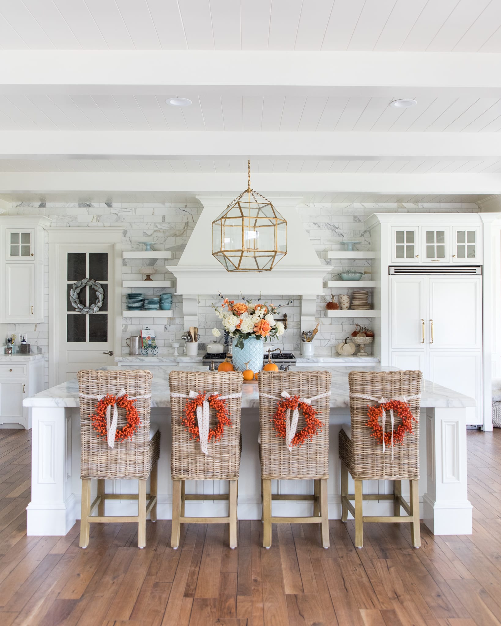 fall home tour fall decor entertaining orange and blue decor flowers pumpkins tables capes home decor