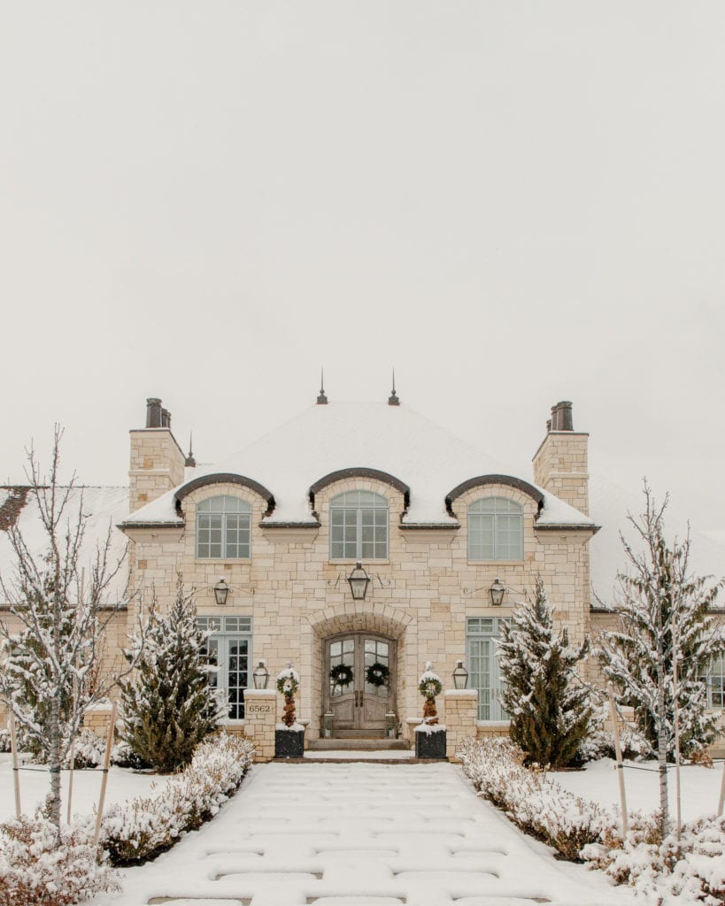 home with holly j outdoor christmas decor pine cone obelisks wreaths christmas decor front door decor french country chateau beautiful homes christmas decor