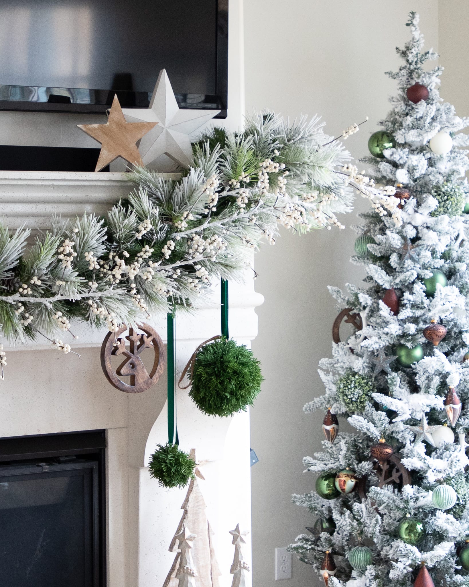 Christmas tree flocked long needle pine christmas tree flocked tree blue decor blue christmas ornaments trimming the tree shades of blue on white blue and cream flocked long needle pine artificial tree blue white ivory cream silver ornaments plaid ribbon