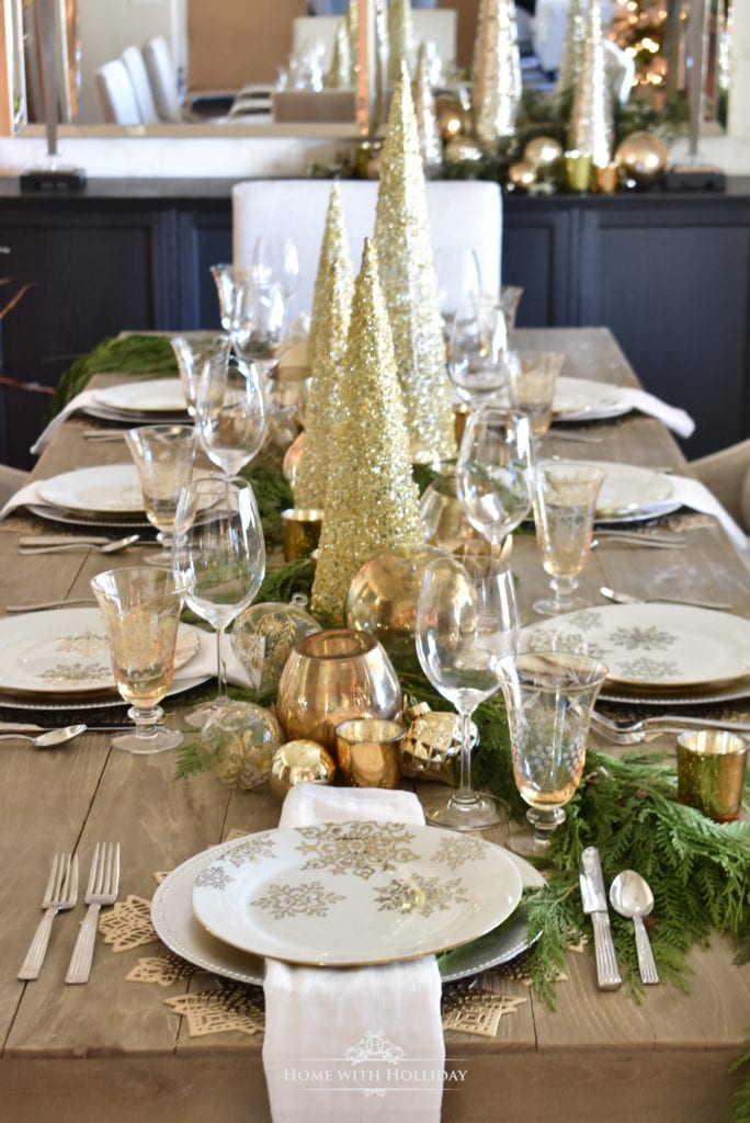 gold and silver table setting tablescape holiday table setting dinner table place setting snowflake christmas decor entertaining christmas parties