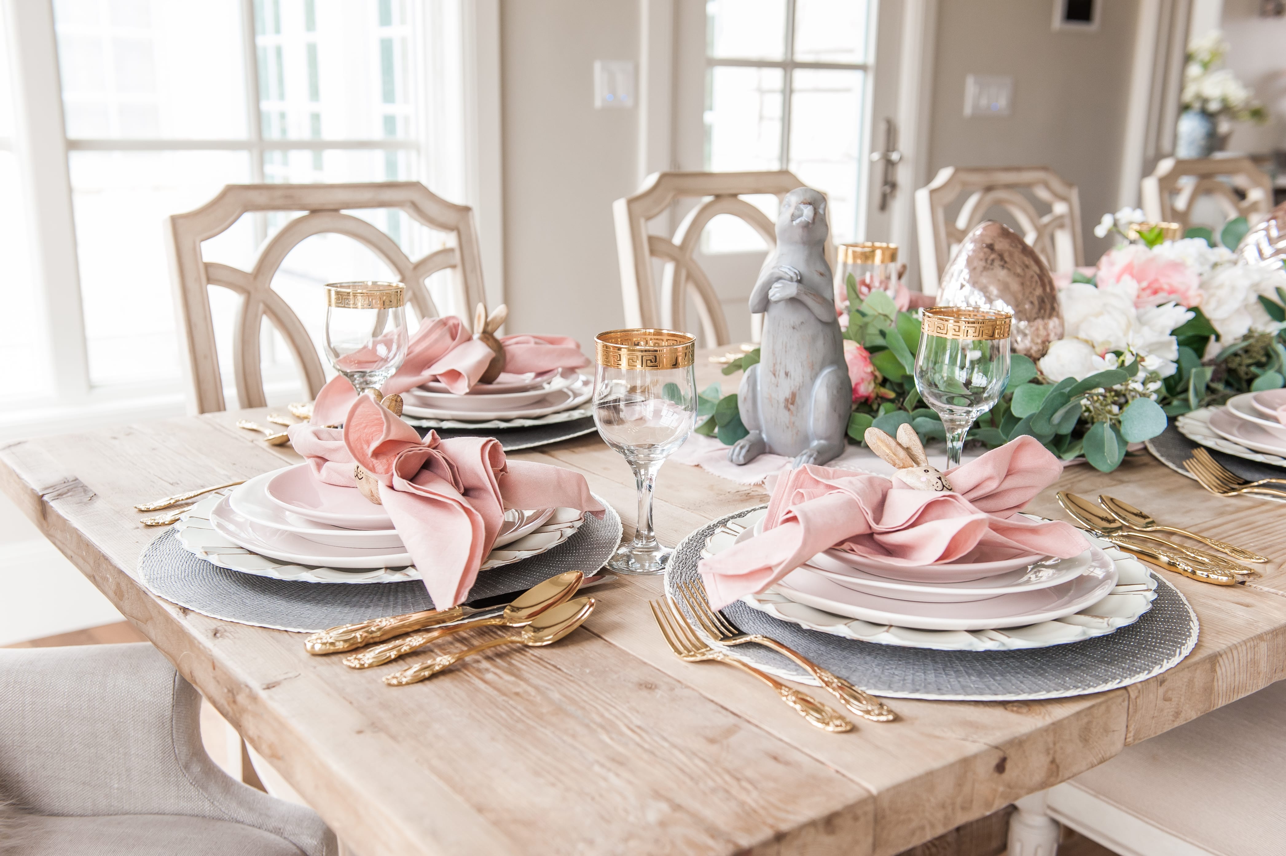 entertaining easter dinner pink easter tablescape table setting place setting bunnies napkin rings pink and gray table decor home decoration dining table dining room table easter table