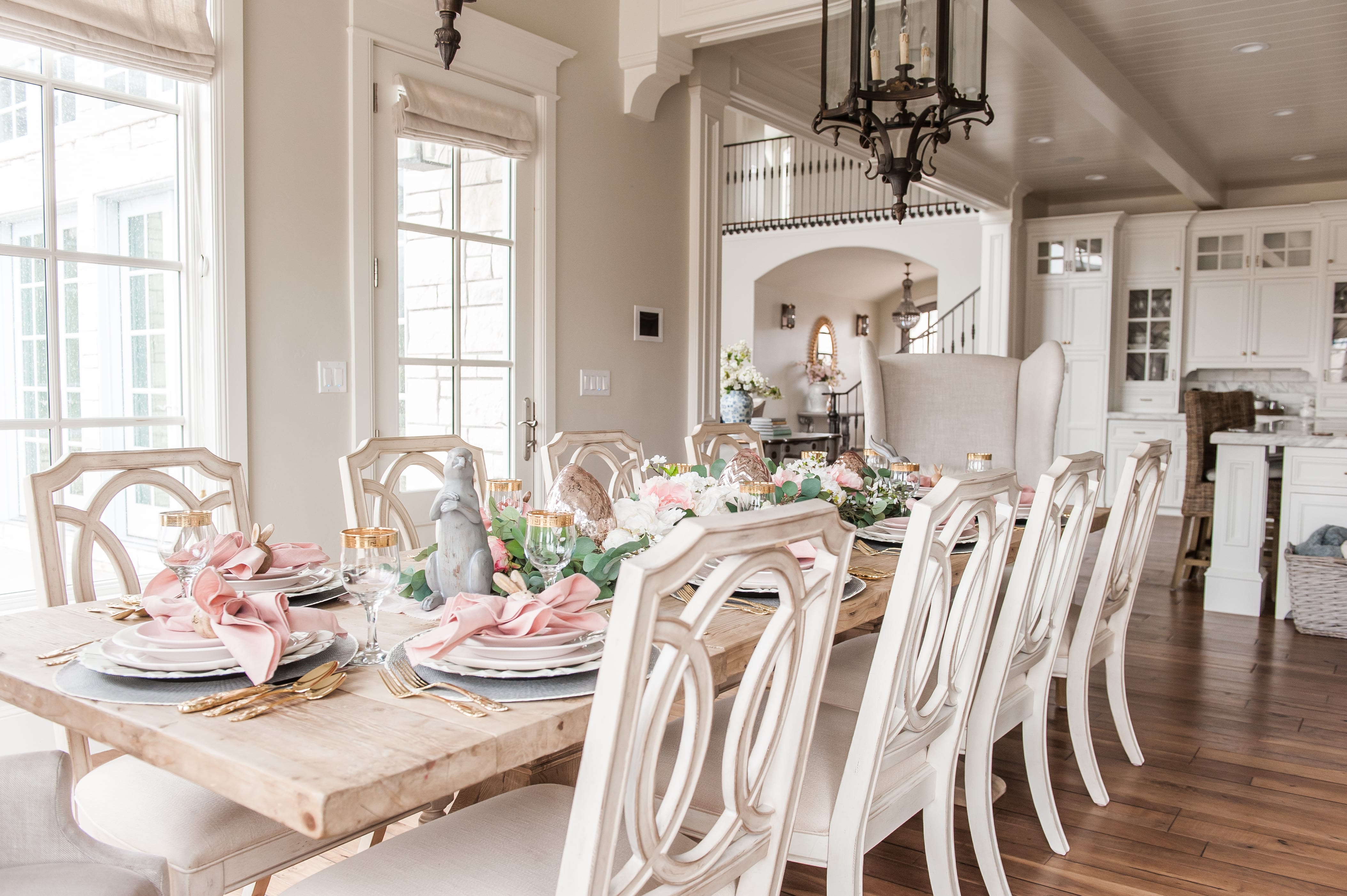 entertaining easter dinner pink easter tablescape table setting place setting bunnies napkin rings pink and gray table decor home decoration dining table dining room table easter table centerpiece garland pink white faux flowers faux greenery