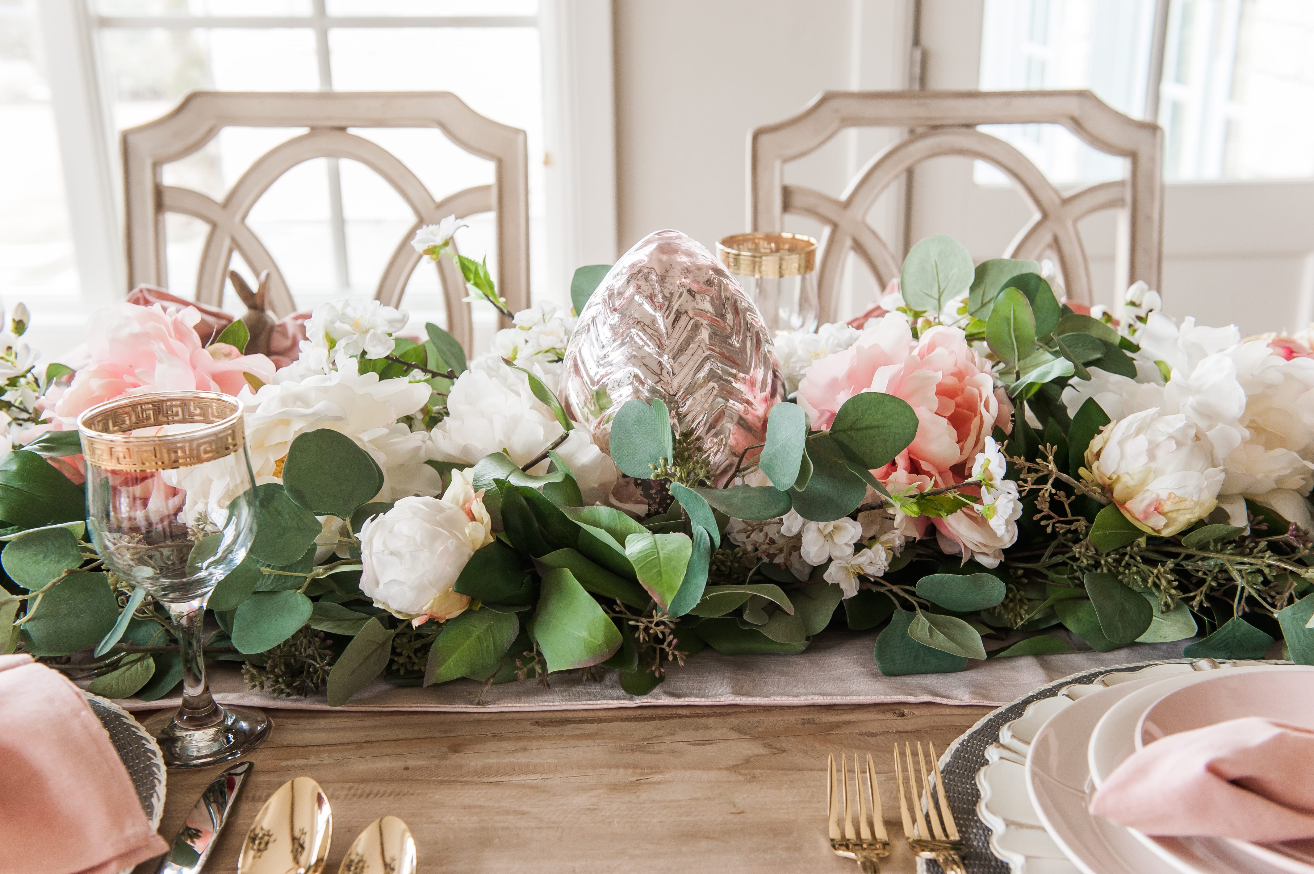 entertaining easter dinner pink easter tablescape table setting place setting bunnies napkin rings pink and gray table decor home decoration dining table dining room table easter table centerpiece garland pink white faux flowers faux greenery