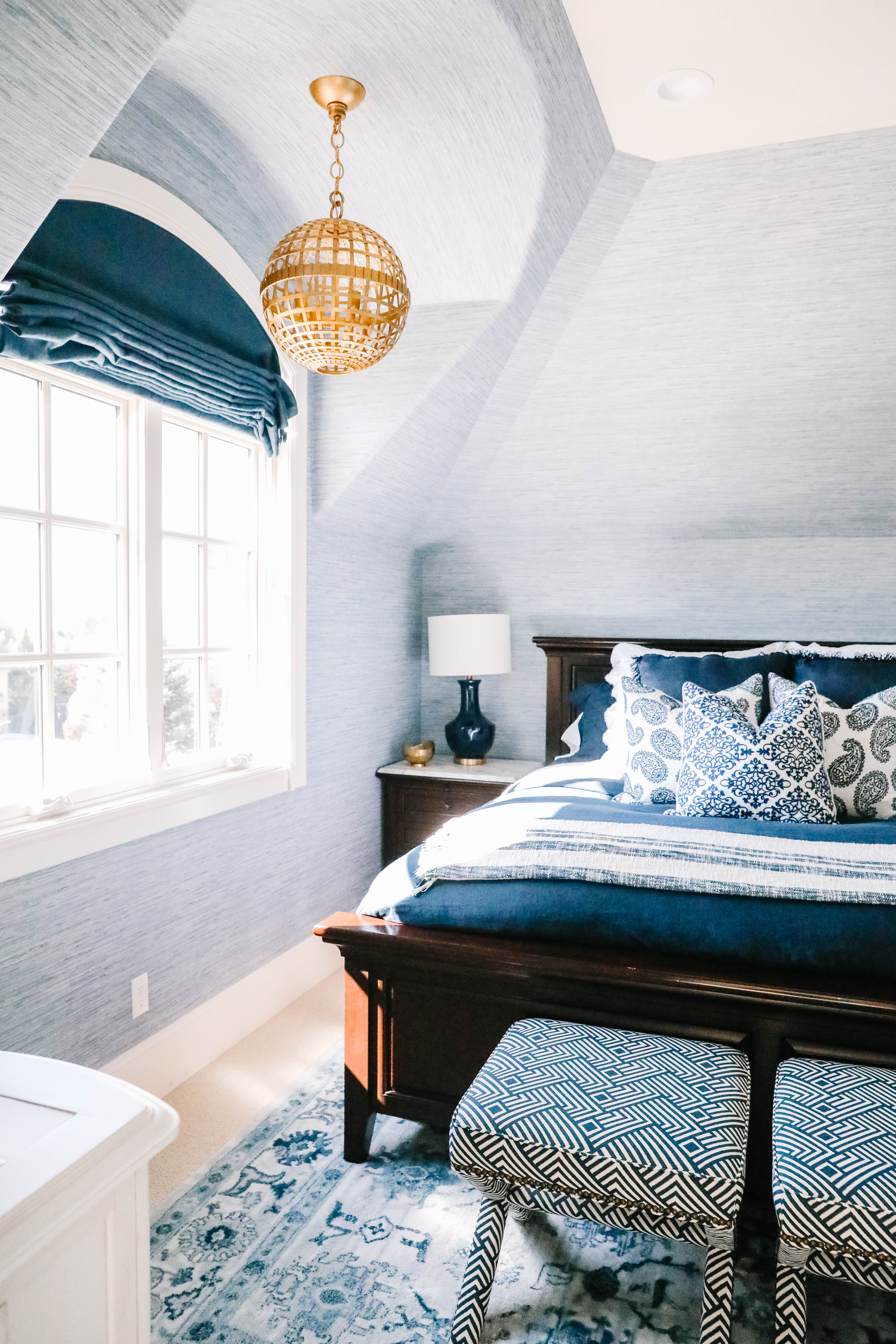 light blue guest room