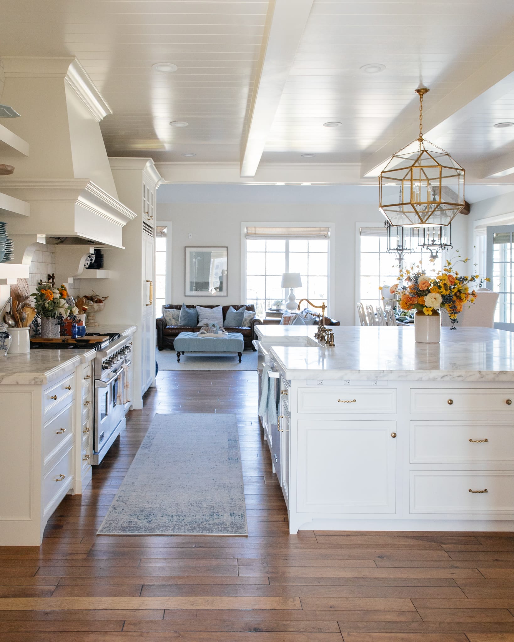 side view of white kitchen decorated for fall