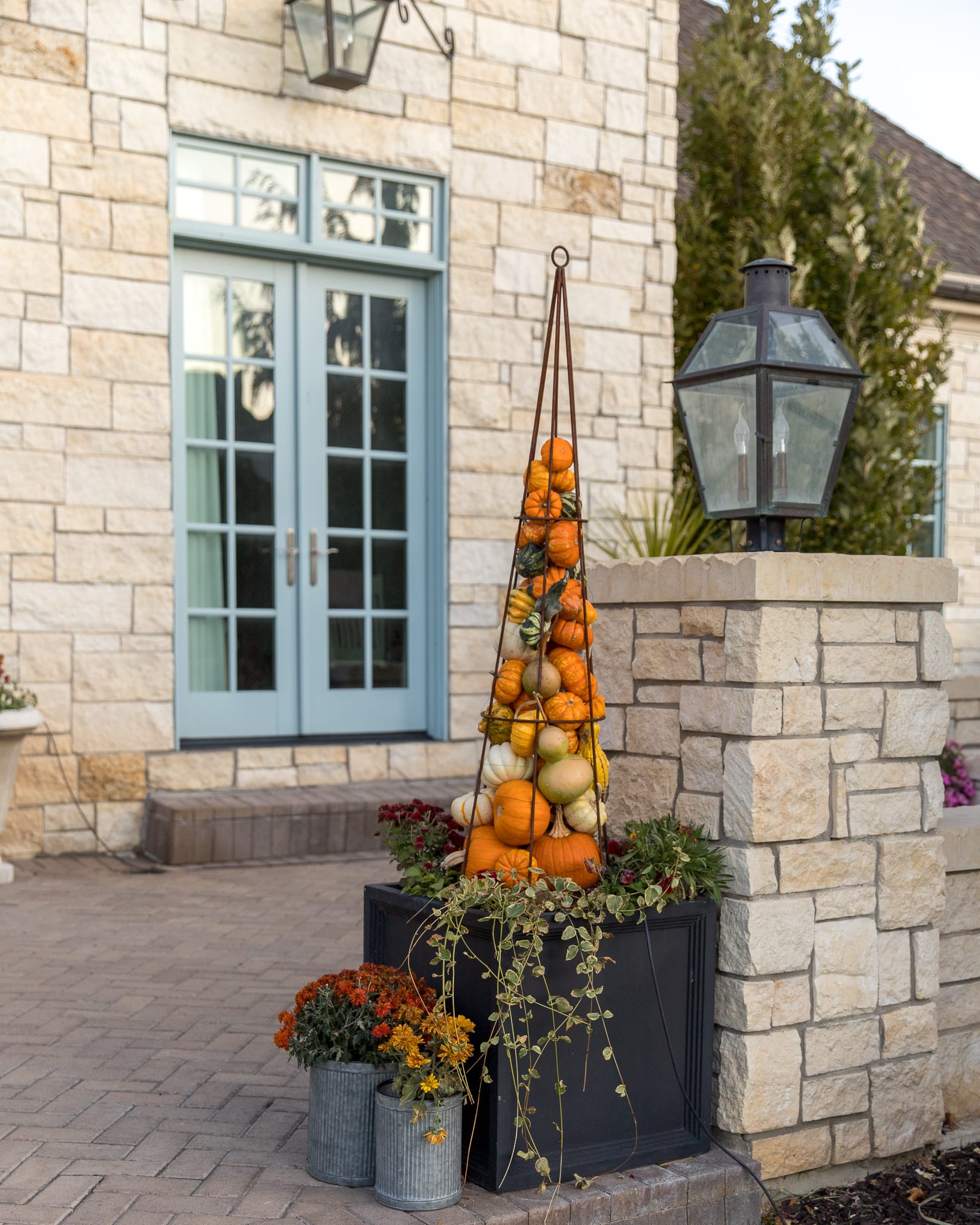 fall front porch decor pumpkin tower obelisks