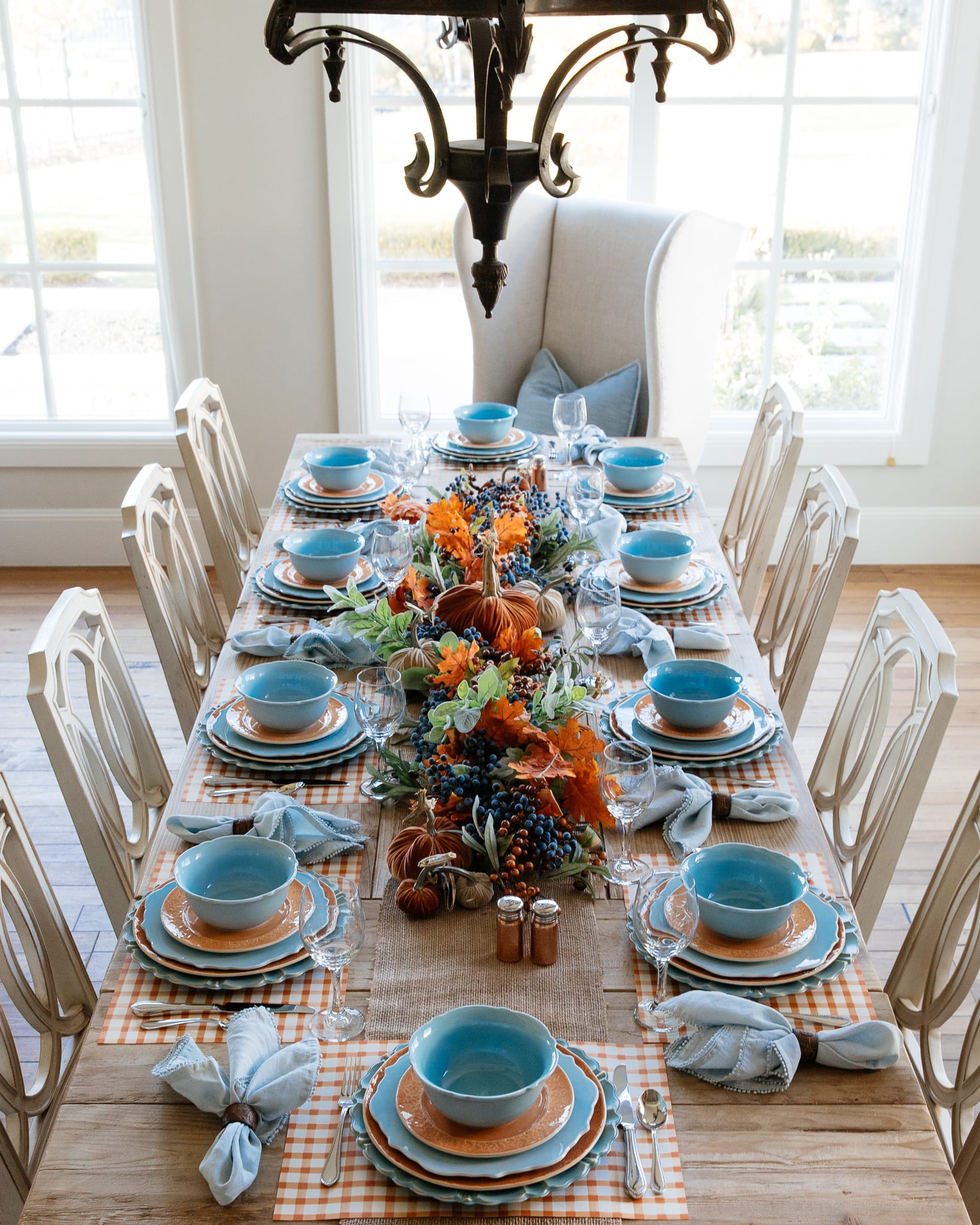 fall pumpkin themed blue and orange tablescape