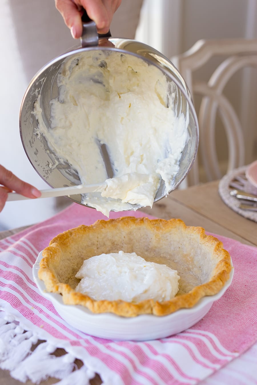 cream cheese filling into pie crust