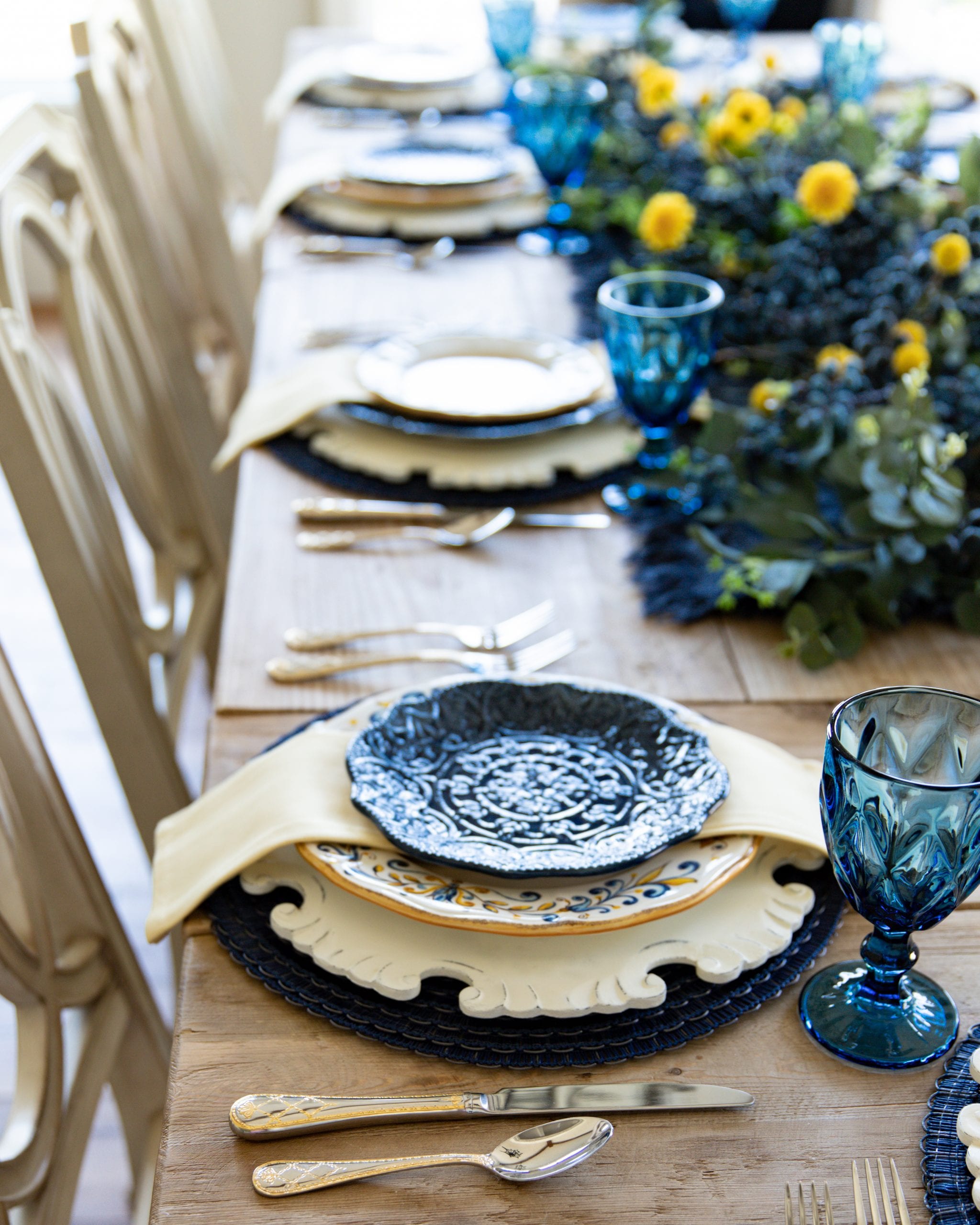 blue and yellow place-settings dinner plates