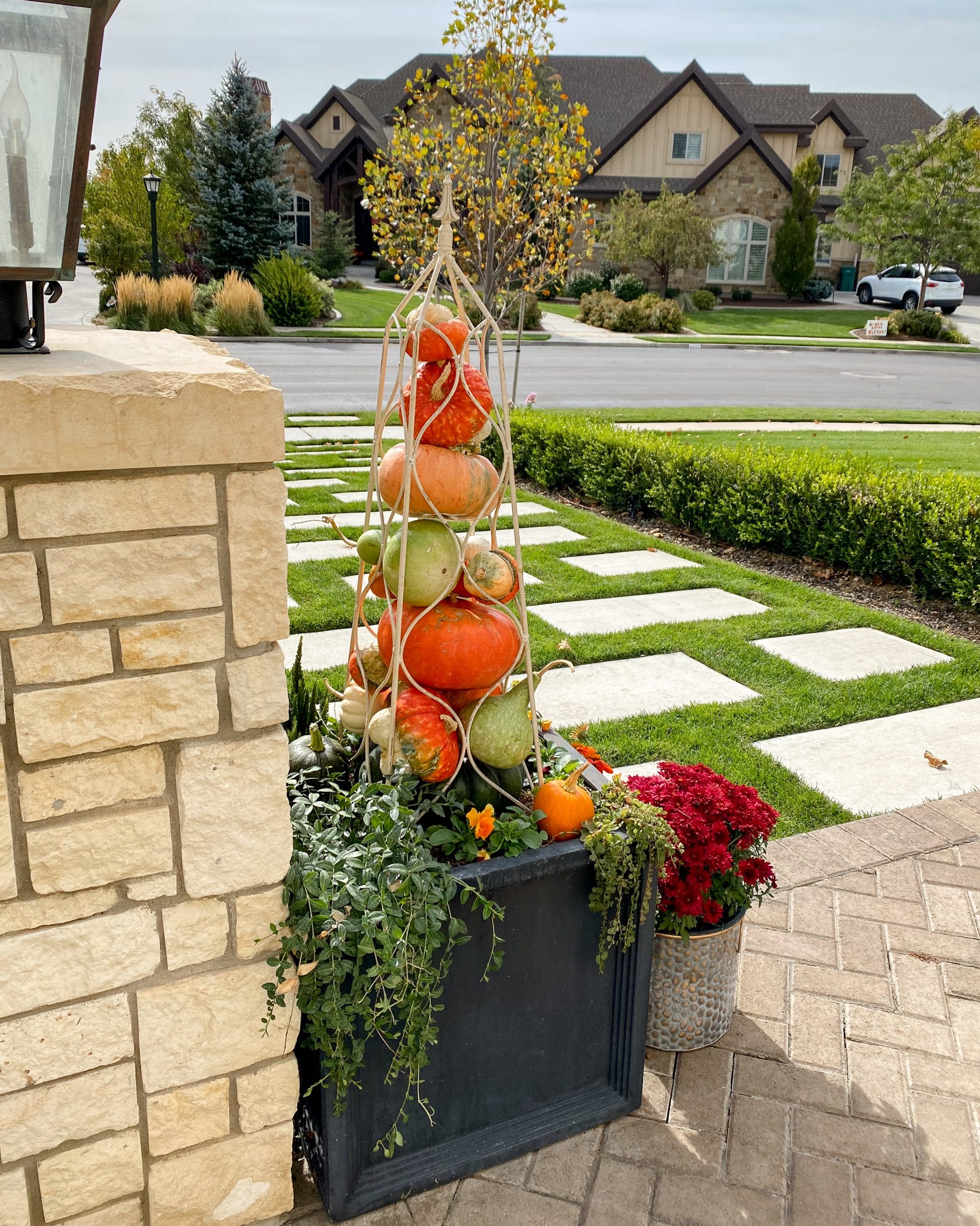 fall flowers planter pumpkin garden obelisk