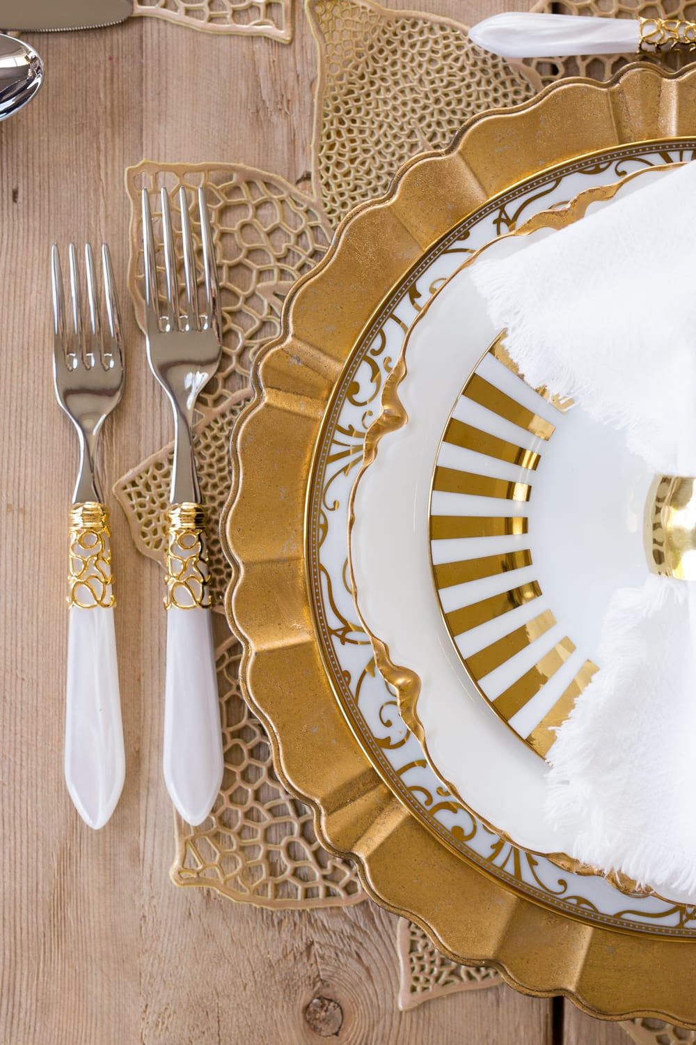 gold and white flatware