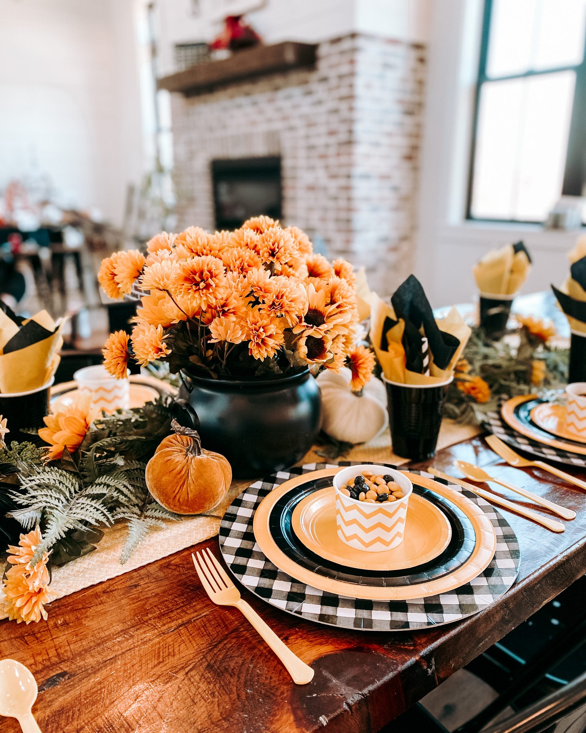 black and yellow paper plate party table