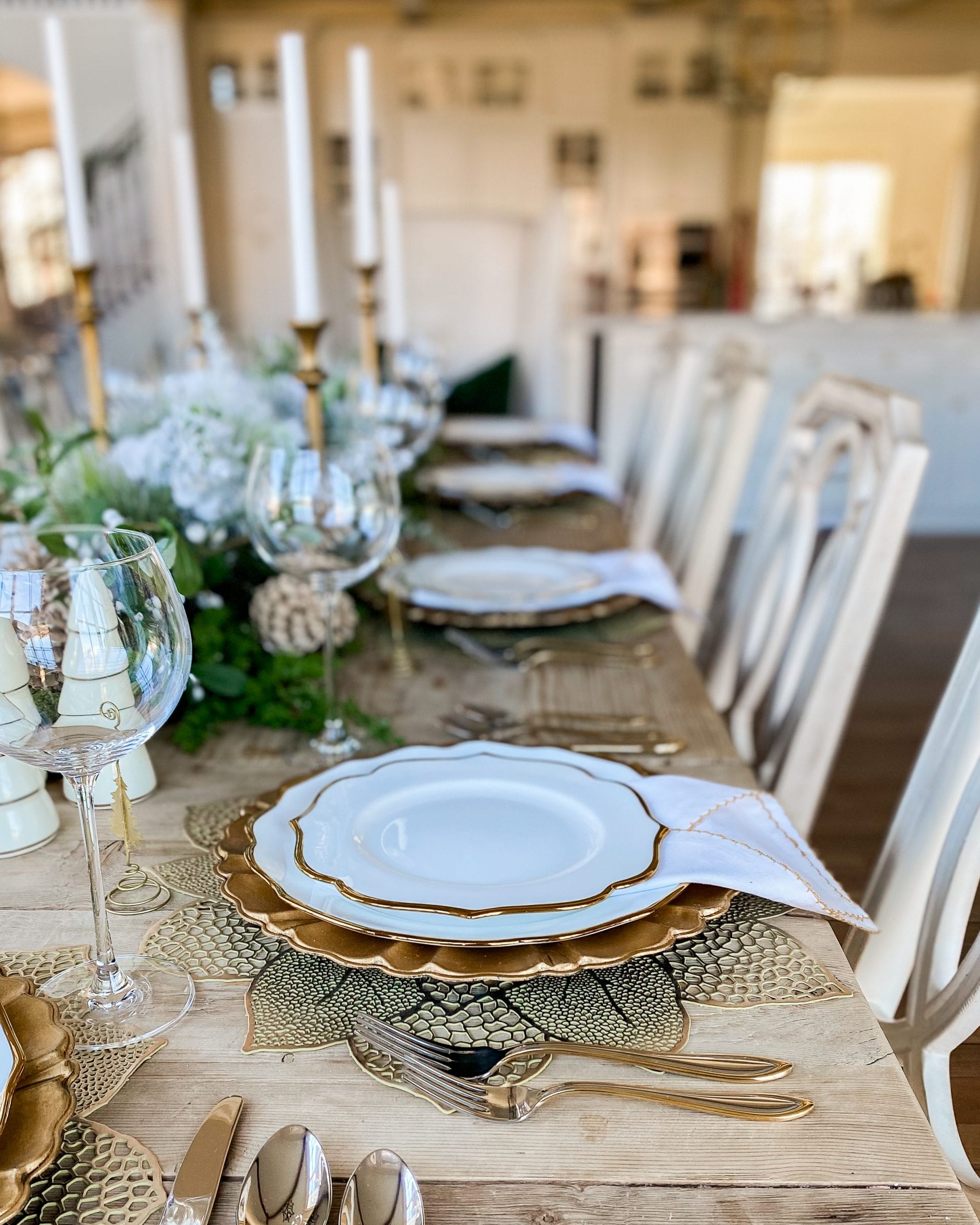 gold and white scalloped dishes