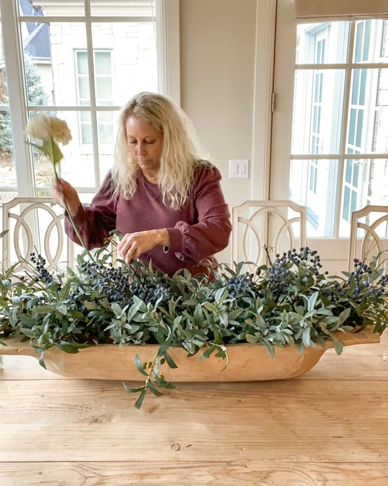 layering greenery dough bowl centerpiece