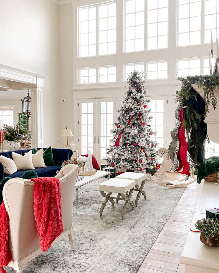 Living Room Christmas Decor Ideas with red blanket on couch