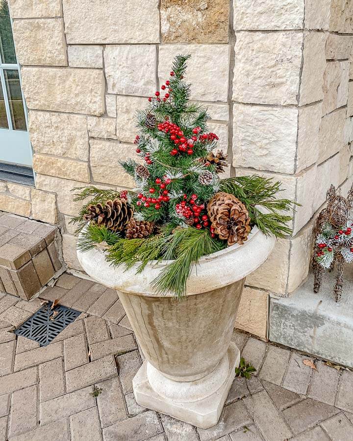 Outdoor Christmas Decor Ideas add festive stone planters