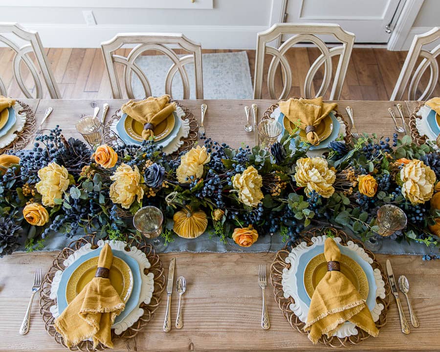 Thanksgiving Table Decor top view of the mustard yellow and light blue centerpiece