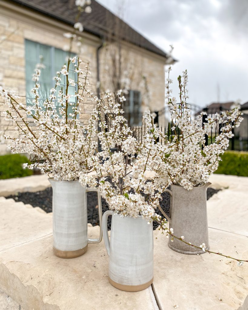 Create a beautiful tablescape for Easter with dusty blue and mango wood accents. Learn how to create this look right now!