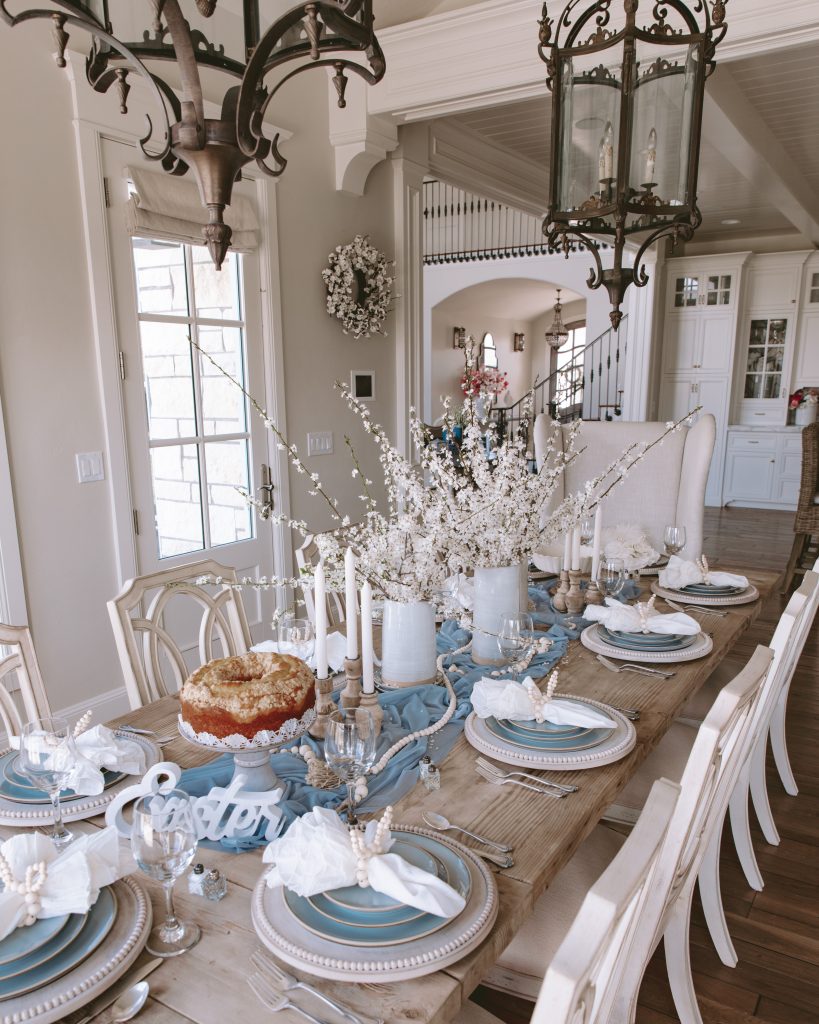 Create a beautiful tablescape for Easter with dusty blue and mango wood accents. Learn how to create this look right now!