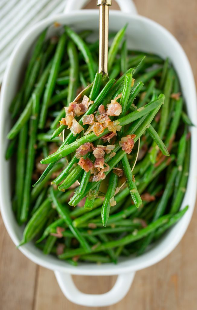 Green beans with pancetta in a dish