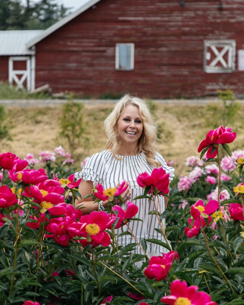 Holly J visiting pure peonies flower farm in the pnw