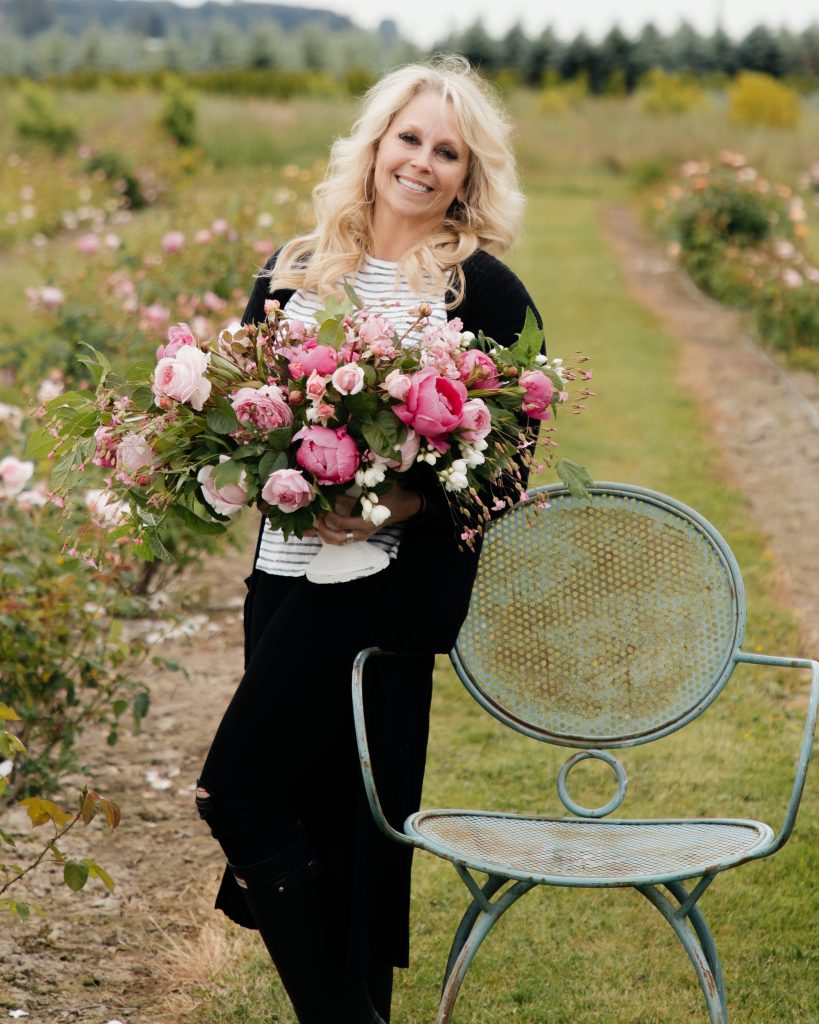 Holding a bouquet of flowers