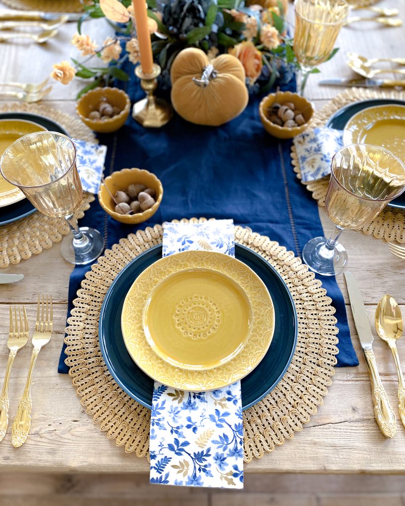 blue and harvest gold place-settings thanksgiving table