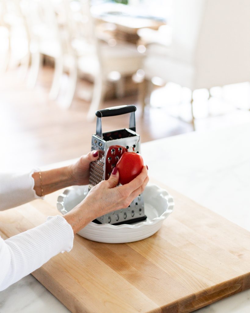 grating tomatoes for tomato butter pasta sauce